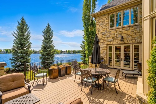 12231 Lake Louise Way Se, Calgary, AB - Outdoor With Body Of Water With Deck Patio Veranda