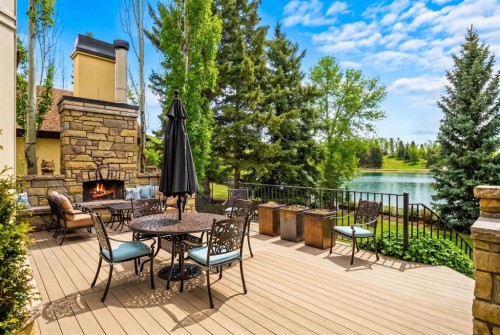 12231 Lake Louise Way Se, Calgary, AB - Outdoor With Body Of Water With Deck Patio Veranda