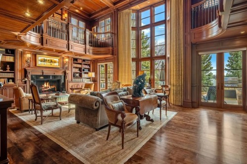 12231 Lake Louise Way Se, Calgary, AB - Indoor With Fireplace