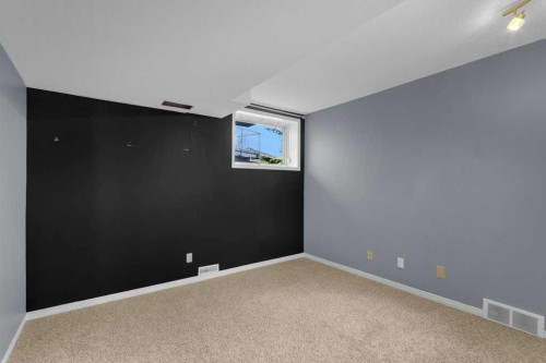 63 Mt Assiniboine Circle Se, Calgary, AB - Indoor Photo Showing Other Room