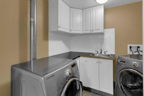 63 Mt Assiniboine Circle Se, Calgary, AB - Indoor Photo Showing Laundry Room