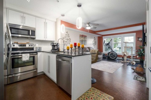 2105-11 Mahogany Row Se, Calgary, AB - Indoor Photo Showing Kitchen With Stainless Steel Kitchen