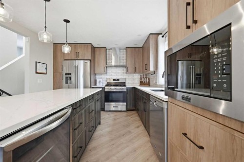 71 Woodfield Drive Sw, Calgary, AB - Indoor Photo Showing Kitchen With Upgraded Kitchen