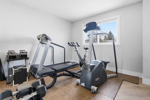 71 Woodfield Drive Sw, Calgary, AB - Indoor Photo Showing Gym Room