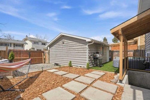 71 Woodfield Drive Sw, Calgary, AB - Outdoor With Deck Patio Veranda With Exterior