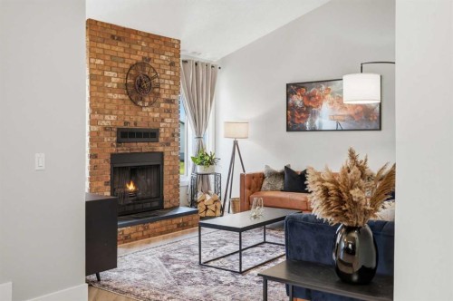 71 Woodfield Drive Sw, Calgary, AB - Indoor Photo Showing Living Room With Fireplace