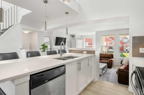 142 Auburn Crest Way Se, Calgary, AB - Indoor Photo Showing Kitchen With Double Sink
