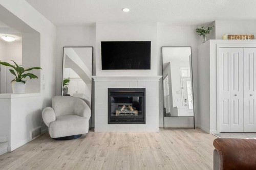 142 Auburn Crest Way Se, Calgary, AB - Indoor Photo Showing Living Room With Fireplace