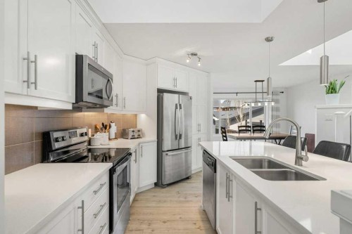 142 Auburn Crest Way Se, Calgary, AB - Indoor Photo Showing Kitchen With Stainless Steel Kitchen With Double Sink With Upgraded Kitchen