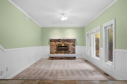 164 Sun Valley Drive Se, Calgary, AB - Indoor With Fireplace