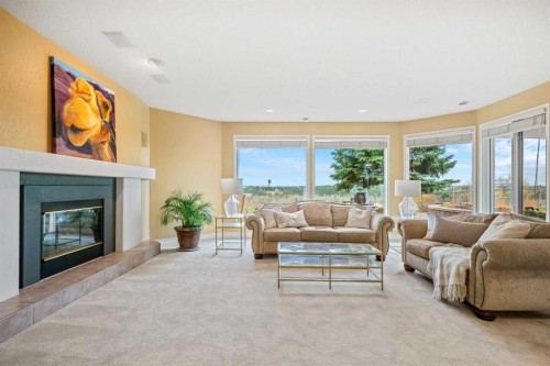 12820 Canso Crescent Sw, Calgary, AB - Indoor Photo Showing Living Room With Fireplace