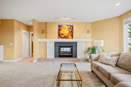 12820 Canso Crescent Sw, Calgary, AB - Indoor Photo Showing Living Room With Fireplace