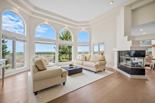 12820 Canso Crescent Sw, Calgary, AB - Indoor Photo Showing Living Room With Fireplace