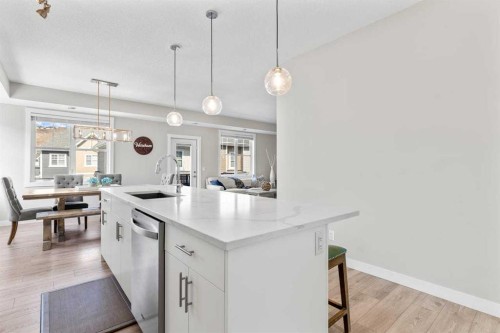 306 Cranbrook Walk Se, Calgary, AB - Indoor Photo Showing Kitchen With Upgraded Kitchen