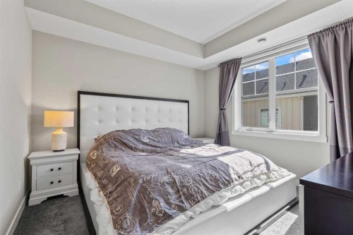 306 Cranbrook Walk Se, Calgary, AB - Indoor Photo Showing Bedroom