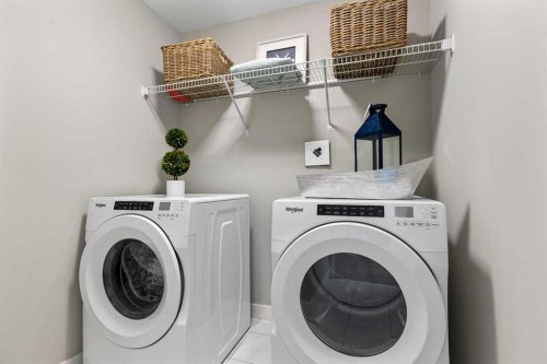 306 Cranbrook Walk Se, Calgary, AB - Indoor Photo Showing Laundry Room
