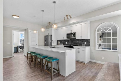 306 Cranbrook Walk Se, Calgary, AB - Indoor Photo Showing Kitchen With Upgraded Kitchen