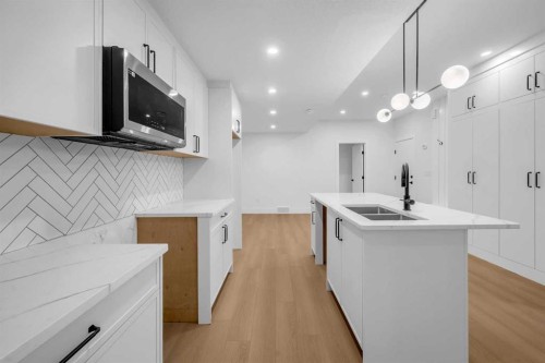 2430 36 Street Sw, Calgary, AB - Indoor Photo Showing Kitchen With Double Sink