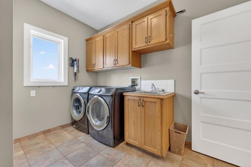 222 Diamond Drive Se, Calgary, AB - Indoor Photo Showing Laundry Room