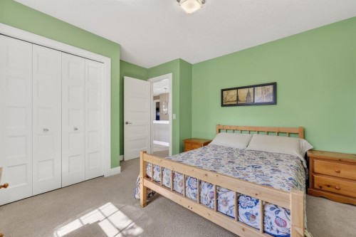 222 Diamond Drive Se, Calgary, AB - Indoor Photo Showing Bedroom