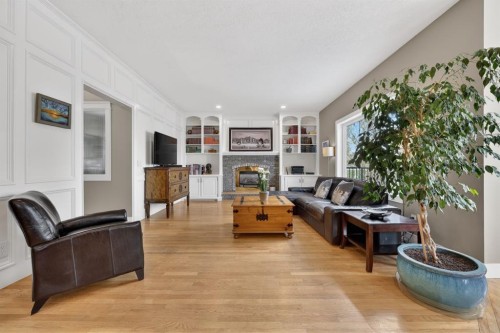 222 Diamond Drive Se, Calgary, AB - Indoor Photo Showing Living Room With Fireplace