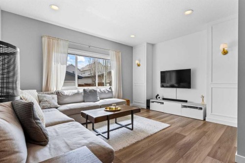 86 Copperpond Heights Se, Calgary, AB - Indoor Photo Showing Living Room