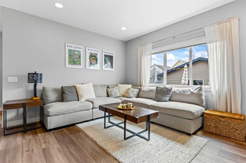 86 Copperpond Heights Se, Calgary, AB - Indoor Photo Showing Living Room