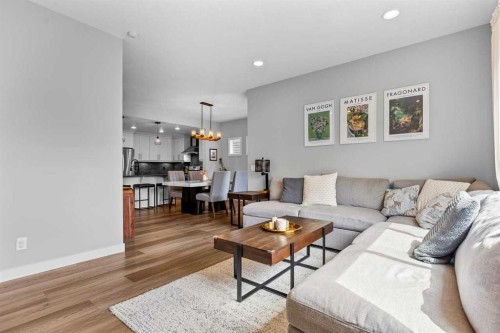 86 Copperpond Heights Se, Calgary, AB - Indoor Photo Showing Living Room