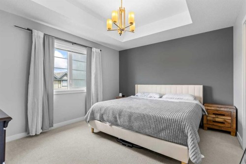 86 Copperpond Heights Se, Calgary, AB - Indoor Photo Showing Bedroom