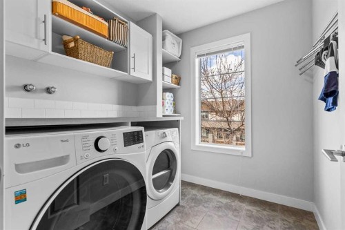 86 Copperpond Heights Se, Calgary, AB - Indoor Photo Showing Laundry Room