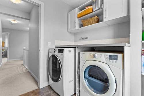 86 Copperpond Heights Se, Calgary, AB - Indoor Photo Showing Laundry Room