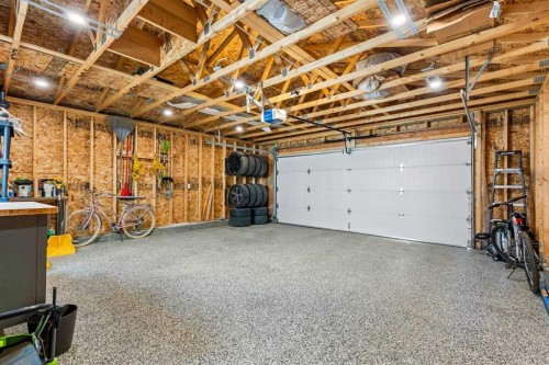 86 Copperpond Heights Se, Calgary, AB - Indoor Photo Showing Garage