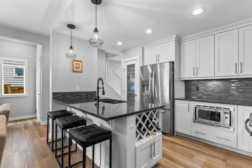 86 Copperpond Heights Se, Calgary, AB - Indoor Photo Showing Kitchen With Upgraded Kitchen