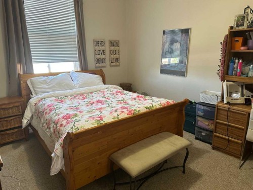 1435 22 Avenue, Didsbury, AB - Indoor Photo Showing Bedroom
