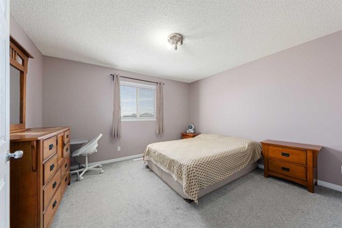 133 Saddlefield Place Ne, Calgary, AB - Indoor Photo Showing Bedroom