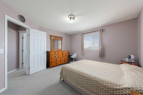 133 Saddlefield Place Ne, Calgary, AB - Indoor Photo Showing Bedroom