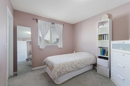 133 Saddlefield Place Ne, Calgary, AB - Indoor Photo Showing Bedroom