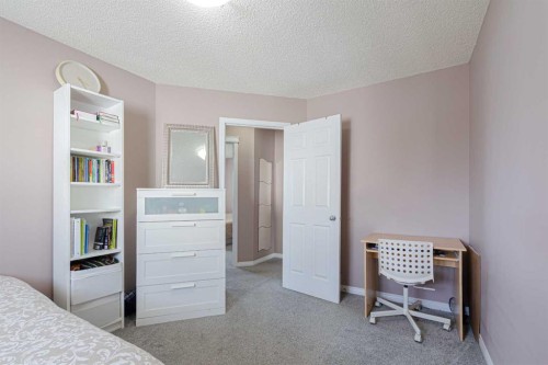 133 Saddlefield Place Ne, Calgary, AB - Indoor Photo Showing Bedroom