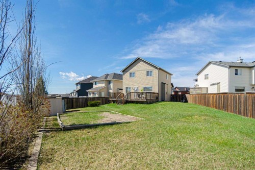 133 Saddlefield Place Ne, Calgary, AB - Outdoor With Backyard