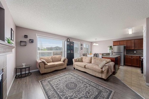 133 Saddlefield Place Ne, Calgary, AB - Indoor Photo Showing Living Room