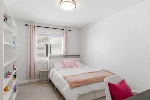 303 Rivercrest Boulevard, Cochrane, AB - Indoor Photo Showing Bedroom