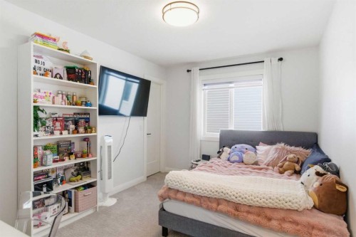 303 Rivercrest Boulevard, Cochrane, AB - Indoor Photo Showing Bedroom