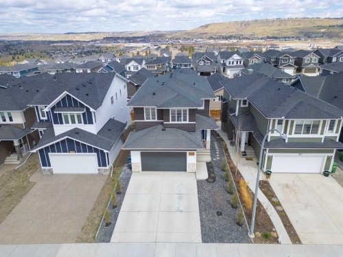 303 Rivercrest Boulevard, Cochrane, AB - Outdoor With Facade