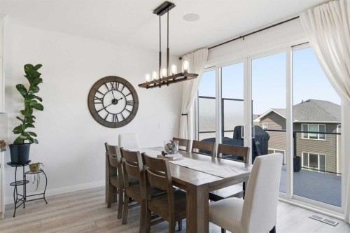 303 Rivercrest Boulevard, Cochrane, AB - Indoor Photo Showing Dining Room