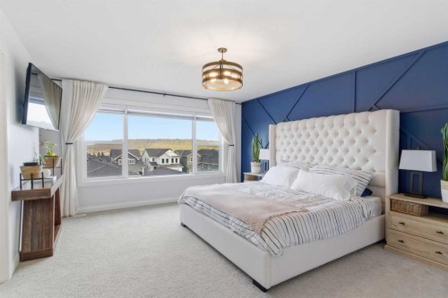 303 Rivercrest Boulevard, Cochrane, AB - Indoor Photo Showing Bedroom