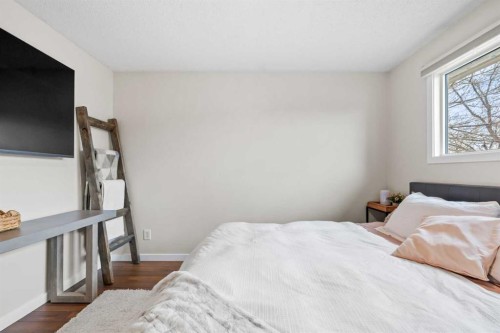 11 Deersaxon Circle Se, Calgary, AB - Indoor Photo Showing Bedroom