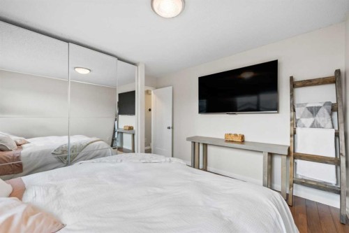 11 Deersaxon Circle Se, Calgary, AB - Indoor Photo Showing Bedroom