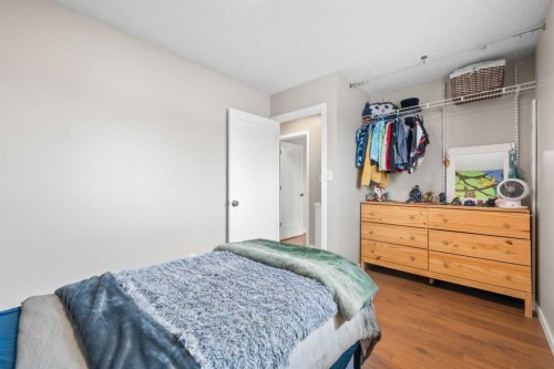 11 Deersaxon Circle Se, Calgary, AB - Indoor Photo Showing Bedroom