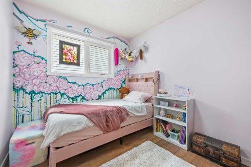 11 Deersaxon Circle Se, Calgary, AB - Indoor Photo Showing Bedroom