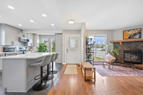 11 Deersaxon Circle Se, Calgary, AB - Indoor With Fireplace
